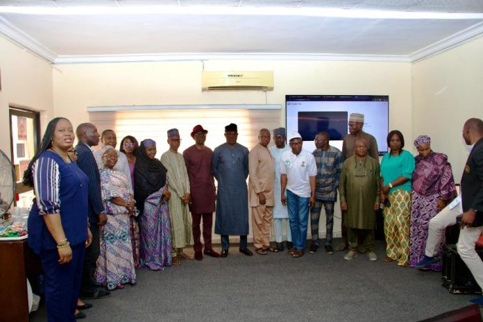The Executive Director, NIWRMC, Dr. Abdulmumini Aminu Zaria (M), Management staff and stakeholders at the orientation meeting for the United Nations 2026 reporting on Sustainable Development Goal Indicator 6.5.1-degree of Integrated Water Resources Management (IWRM) implementation in Nigeria, in Abuja