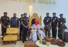 Delta CP Yemi Oyeniyi psc, acipm, mnips, Standing By The Right Of The Asagba Joined By His Team In A Photograph With The Asagba In His Palace