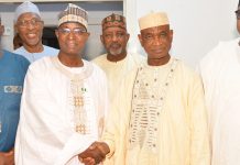 The Honourable Minister Federal Ministry of Livestock Development, Idi Mukhtar Maiha in a handshake with the Lead Delegation Al- Mustafa OFR
