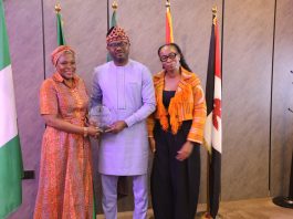 The Honourable Minister of Interior, Dr. Olubunmi Tunji-Ojo (middle); Senior Adviser to the Honeywell Group, Mrs. Oluywayemisi Busari, (left) and Group’s Chief Operating Officer, Ms. Tomi Otudeko, (right) in a photograph during the courtesy visit