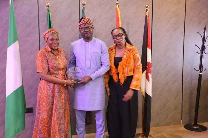 The Honourable Minister of Interior, Dr. Olubunmi Tunji-Ojo (middle); Senior Adviser to the Honeywell Group, Mrs. Oluywayemisi Busari, (left) and Group’s Chief Operating Officer, Ms. Tomi Otudeko, (right) in a photograph during the courtesy visit