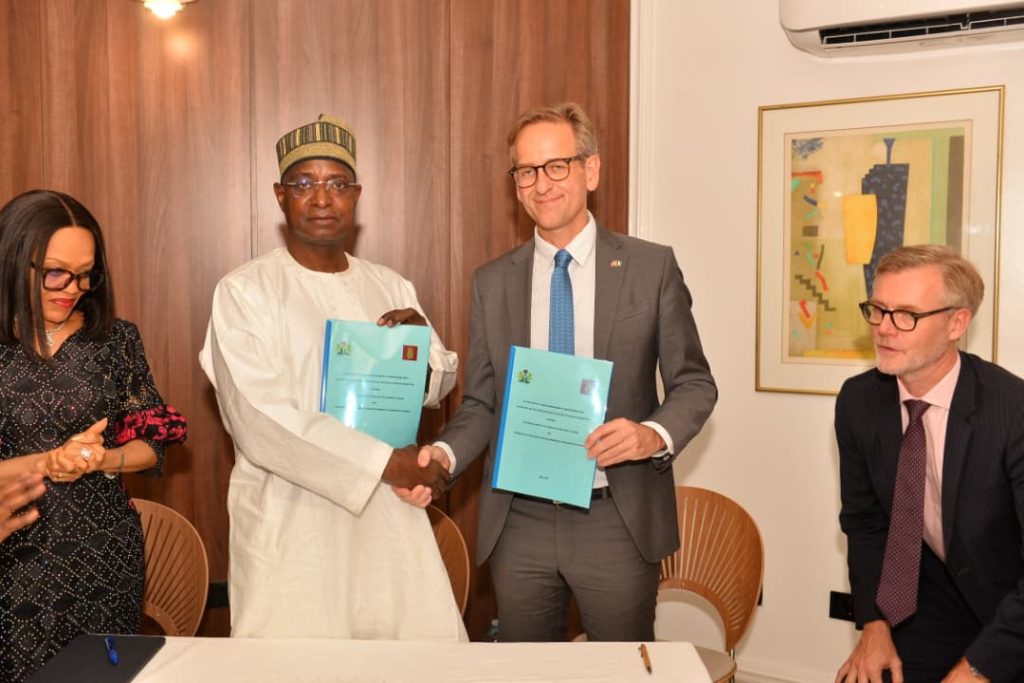 The Honourable Minister of Federal Ministry of Livestock Development , idi Mukhtar Maiha and the Danish Ambassador to Nigeria,  Jens Ole Bach Hansen during the  Letter of intent and Mou signing ceremony.