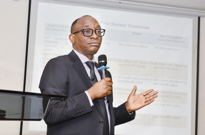 IMG-20260610-WA0339 Director-General, Bureau of Public Procurement (BPP) Dr. Adebowale A. Adedokun, FCIPS delivering his presentation at the Stakeholders Engagement Organised by the NHIA in Abuja