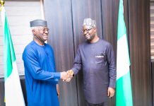 L- R: The leader of the delegation, Sen. Dr.Eze D. Ajoku and the Honourable Minister of Humanitarian Affairs and Poverty Reduction. Dr. Bernard M.Doro in a warm handshake when COSROPIN visited the Honourable Minister in his office.