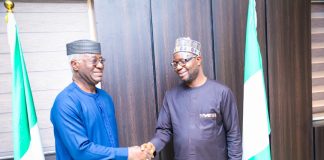 L- R: The leader of the delegation, Sen. Dr.Eze D. Ajoku and the Honourable Minister of Humanitarian Affairs and Poverty Reduction. Dr. Bernard M.Doro in a warm handshake when COSROPIN visited the Honourable Minister in his office.