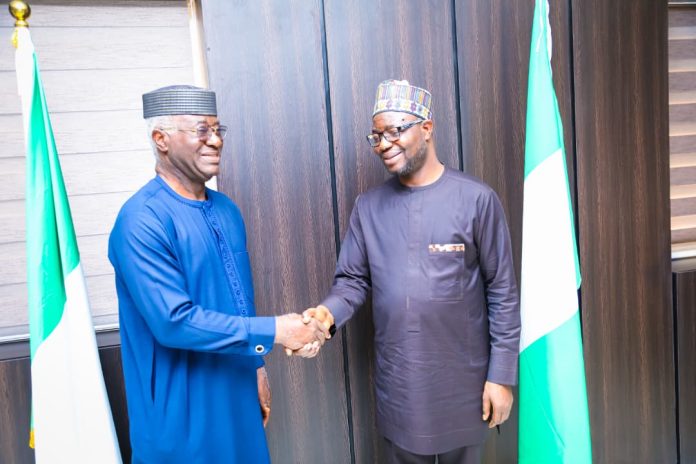 IMG-20260611-WA0152 L- R: The leader of the delegation, Sen. Dr.Eze D. Ajoku and the Honourable Minister of Humanitarian Affairs and Poverty Reduction. Dr. Bernard M.Doro in a warm handshake when COSROPIN visited the Honourable Minister in his office.