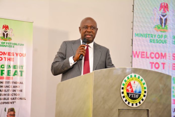 IMG-20260612-WA0086 Minister of State for Petroleum Resources (Oil), Senator Heineken Lokpobiri, delivering his keynote address at the Management Retreat of the Ministry of Petroleum Resources