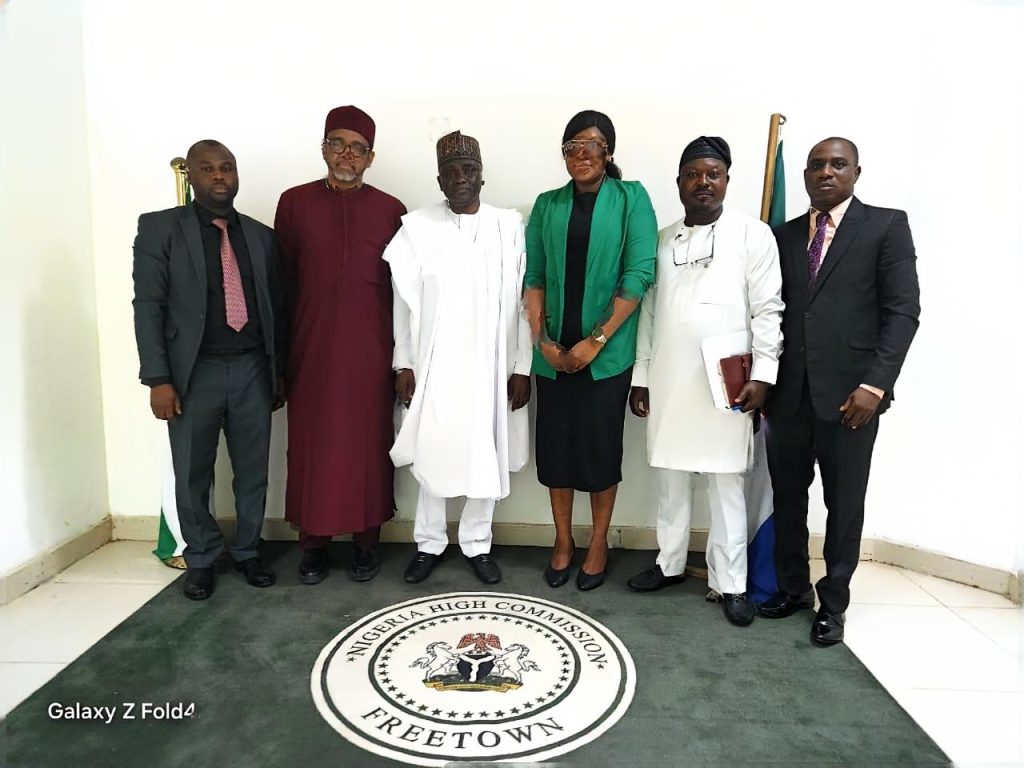 *DG/CEO, Nigerian Technical Aid Corps (NTAC), Rt. Hon. Yusuf Buba Yakub* (3rd right), flanked by *Amb. Bello A. Jaye, Director of Programmes, NTAC;* Mr. Abdulkadir Iliyasu, SA (Legal) to the DG; Mrs. Ivie Okojie-Imarah, Head of Chancery, Nigerian High Commission, Sierra Leone; Mr. Falusi H. Dapo, Assistant Director, NTAC; and Mr. Rimdap R. Samson, NTAC Desk Officer, during the NTAC delegation's visit to Sierra Leone.