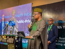 Dr Iziaq Adekunle Salako Honourable Minister of State for Health and Social Welfare delivering his keynote address at the National Healthcare Electrification Investor Matchmaking Forum, held in Lagos.