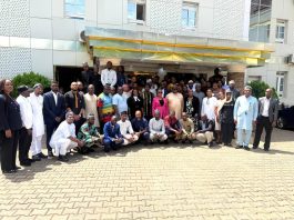 Group Photograph: Director-General, Nigeria Mining Cadastre Office (NMCO), Engr. Obadiah Simon Nkom, alongside Management Staff and newly employed staff (inductees) during a group photograph after the first session of the ongoing induction programme for newly recruited NMCO staff, held on Tuesday, 16th June 2026 at the Immaculate Platinum Luxury Resort Hotel, Lobito Crescent, Wuse II, Abuja.