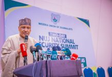 The Honourable Minister of Information and National Orientation, Mohammed Idris, fnipr, delivers his address as Chairman of the Occasion and Chief Host at the National Security Summit organised by the Nigeria Union of Journalists (NUJ) in collaboration with the Department of State Services (DSS) on June 18, 2026, at the Abuja Continental Hotel, Abuja. The Minister emphasized the need for stronger collaboration between the media and security agencies, describing both institutions as critical partners in nation-building. He also highlighted the Federal Government’s commitment to enhancing national security through strategic communication, responsible journalism, and sustained stakeholder engagement. Photo: Khalid Ahmed/FMINO.