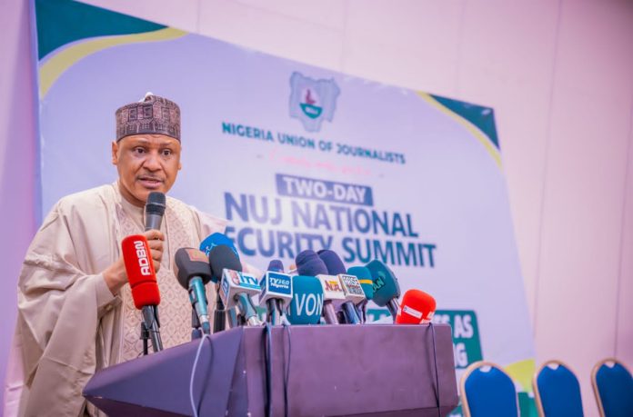 IMG-20260618-WA0078 The Honourable Minister of Information and National Orientation, Mohammed Idris, fnipr, delivers his address as Chairman of the Occasion and Chief Host at the National Security Summit organised by the Nigeria Union of Journalists (NUJ) in collaboration with the Department of State Services (DSS) on June 18, 2026, at the Abuja Continental Hotel, Abuja. The Minister emphasized the need for stronger collaboration between the media and security agencies, describing both institutions as critical partners in nation-building. He also highlighted the Federal Government’s commitment to enhancing national security through strategic communication, responsible journalism, and sustained stakeholder engagement. Photo: Khalid Ahmed/FMINO.