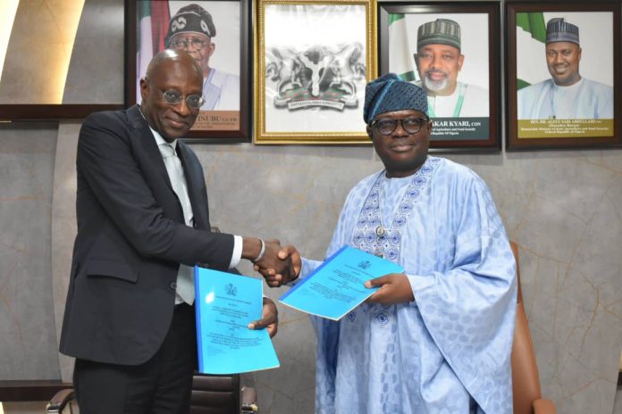 The Permanent Secretary,FMAFS, Dr Marcus Olaniyi Ogunbiyi and Executive Director, IFDC, Mr BayellaThiam, during the MoU Signing ceremony.