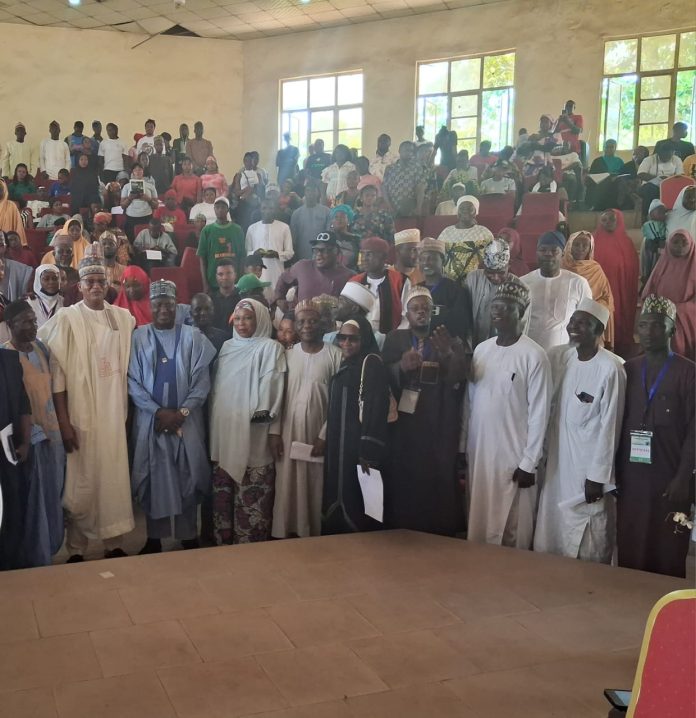 The Minister of State for Agriculture and Food Security and Supervising Minister of Cooperative Affairs, Sen Dr Aliyu Sabi Abdullahi (C) , other stakeholders and Students of Federal Cooperative College, Kaduna State during the Summit.