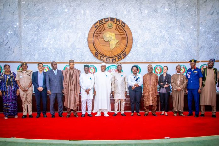 (7th left) Secretary to the Government of the Federation, Sen. George Akume, CON flanked by Honourable Minister, Federal Ministry Humanitarian Affairs Poverty Reduction, Dr Bernard Doro, (7th right) Federal Commissioner/CEO of National Commission for Refugees, Migrants and Internally Displaced Persons (NCFRMI) Aliyu Tijani Ahmed (6th left), other government officials and international partners at the 2026 World Refugees Day that took place in Abuja.