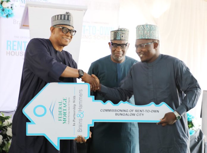 IMG-20260624-WA0135 Official commissioning and hanging over of keys to beneficiaries of rent-to-own housing scheme at Brains & Hammers Bungalow City, dei-dei- zuba road. Abuja, June 23, 2026