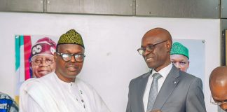 Dr. Donald Ibe Ofili in handshake with the Honourable Minister of State for Health and Social Welfare Dr Iziaq Adekunle Salako immediately after receiving his letter of appointment