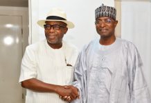 The Honourable Minister of Livestock Development, Idi Mukhtar Maiha in a handshake with the Chairman/ CEO Chromedix Pharmaceuticals company, Sir Emeka Offor