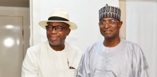 The Honourable Minister of Livestock Development, Idi Mukhtar Maiha in a handshake with the Chairman/ CEO Chromedix Pharmaceuticals company, Sir Emeka Offor