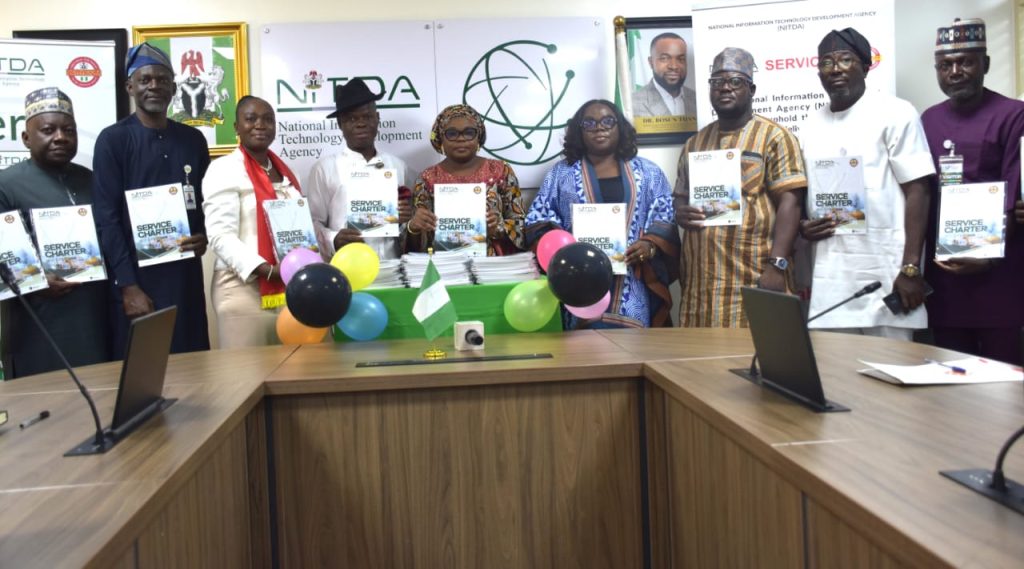 SERVICOM Desk Officer for NITDA Mr. Duruba Sesugh, SERVICOM Team B Lead, Dr. Ben Olofu, SERVICOM Office Public Awareness Manager, Mr. Aderemi Adelabu, the Ag. National Coordinator/CEO of the SERVICOM Office, Mrs. Helen Lawal, the Head of SERVICOM Operations, Mrs. Ngozi Akinbodewa, the representative of the Director General/CEO of NITDA/Director of Corporate Planning & Strategy, Dr. Dimie Shively Warowei, NITDA Nodal Officer/Deputy Director Reform Coordination and Service Improvement, Mrs. Tariundu Ndoni, the Director Special Duties Oladeji Olawumi and Director Human Resource and Administration Mr. Sarafa Lawal during the launch and unveiling of the 6th edition of the National Information Technology Development Agency’s (NITDA) Service Charter today, 24th June, 2026 in Abuja.