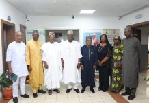 (4th left)The representative of the Secretary to the Government of the Federation and Permanent Secretary (General Services Office), Dr. Ibrahim Abubakar Kana mni flanked by the Chairman, Presidential Committee on Trade Malpractices, Malam Dahiru-Ado Kurawa (3rd left) Director (General Services) OSGF, Idris Ibrahim (4th right) along with other committee members and some Management Staff of OSGF in a group photograph during the courtesy visit in Abuja.