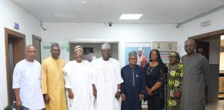 (4th left)The representative of the Secretary to the Government of the Federation and Permanent Secretary (General Services Office), Dr. Ibrahim Abubakar Kana mni flanked by the Chairman, Presidential Committee on Trade Malpractices, Malam Dahiru-Ado Kurawa (3rd left) Director (General Services) OSGF, Idris Ibrahim (4th right) along with other committee members and some Management Staff of OSGF in a group photograph during the courtesy visit in Abuja.