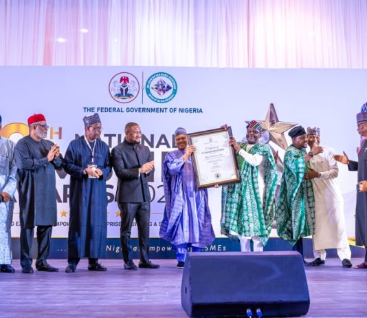 *INFORMATION MINISTER HONOURED FOR ADVANCING MSME AND JOB CREATION INITIATIVES UNDER THE RENEWED HOPE AGENDA* (L–R) Director-General, National Broadcasting Commission (NBC), Mr. Charles Ebuebu; Mr. Abdulmalik Muye; Executive Secretary/Chief Executive Officer, Nigerian Press Council (NPC), Dr. Dili Ezughah; Director-General, News Agency of Nigeria (NAN), Malam Ali Muhammad Ali; Director-General/Chief Executive Officer, Small and Medium Enterprises Development Agency of Nigeria (SMEDAN), Mr. Charles Odii; Honourable Minister of Information and National Orientation, Mohammed Idris, fnipr; Representative of the Vice President of the Federal Republic of Nigeria and Deputy Chief of Staff to the President (Office of the Vice President), Senator Ibrahim Hassan Hadejia; Senior Special Assistant to the President on MSMEs and Job Creation, Mr. Temitola Adekunle-Johnson; Director-General, Voice of Nigeria (VON), Mallam Jibrin Baba Ndace; and Director-General, Federal Radio Corporation of Nigeria (FRCN), Dr. Mohammed Bulama, during the presentation of a Certificate of Commendation to the Honourable Minister in recognition of his support for the MSME and Job Creation Sector at the 2026 National MSME Awards and the Public Presentation of the Compendium of Activities under the Renewed Hope Agenda, held at the State House Conference Centre, Abuja, on June 27, 2026. Photo: Khalid Ahmed/FMINO.