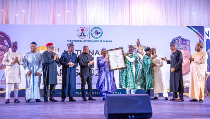 *INFORMATION MINISTER HONOURED FOR ADVANCING MSME AND JOB CREATION INITIATIVES UNDER THE RENEWED HOPE AGENDA* (L–R) Director-General, National Broadcasting Commission (NBC), Mr. Charles Ebuebu; Mr. Abdulmalik Muye; Executive Secretary/Chief Executive Officer, Nigerian Press Council (NPC), Dr. Dili Ezughah; Director-General, News Agency of Nigeria (NAN), Malam Ali Muhammad Ali; Director-General/Chief Executive Officer, Small and Medium Enterprises Development Agency of Nigeria (SMEDAN), Mr. Charles Odii; Honourable Minister of Information and National Orientation, Mohammed Idris, fnipr; Representative of the Vice President of the Federal Republic of Nigeria and Deputy Chief of Staff to the President (Office of the Vice President), Senator Ibrahim Hassan Hadejia; Senior Special Assistant to the President on MSMEs and Job Creation, Mr. Temitola Adekunle-Johnson; Director-General, Voice of Nigeria (VON), Mallam Jibrin Baba Ndace; and Director-General, Federal Radio Corporation of Nigeria (FRCN), Dr. Mohammed Bulama, during the presentation of a Certificate of Commendation to the Honourable Minister in recognition of his support for the MSME and Job Creation Sector at the 2026 National MSME Awards and the Public Presentation of the Compendium of Activities under the Renewed Hope Agenda, held at the State House Conference Centre, Abuja, on June 27, 2026. Photo: Khalid Ahmed/FMINO.