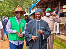 The Honourable Minister Idi Mukhtar Maiha with the Founder of Integrated dairy Ltd, AVM Ishaya Shekarri Rtd during the Facility tour of the Farm in Vom, Plateau State.