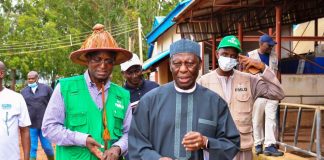 The Honourable Minister Idi Mukhtar Maiha with the Founder of Integrated dairy Ltd, AVM Ishaya Shekarri Rtd during the Facility tour of the Farm in Vom, Plateau State.