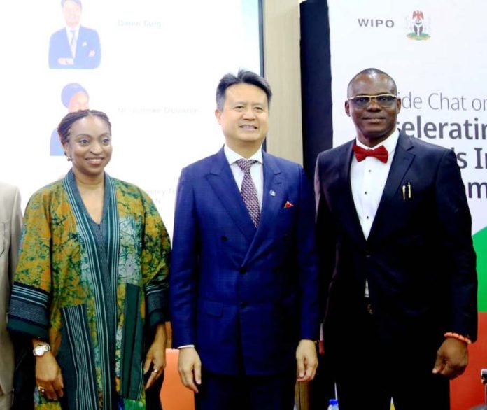 The Hon. Min. FMITI, Dr. Jumoke Oduwole MFR, (left) the Perm. Sec. FMITI,Dr. Chris Osa Isokpunwu (right) and DG WIPO, Mr Daren Tang , (middle) during a Roundtable Discussion on Accelerating Nigeria's Innovation Ecosystem, held at the Innovation Hub Airport Road Abuja, on Monday 1/6/26.