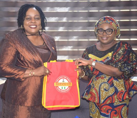 R – L, The Ag. National Coordinator/CEO of the SERVICOM Office, Mrs. Helen Lawal presenting SERVICOM awareness materials to the Registrar and Chief Executive of Teachers Registration Council of Nigeria (TRCN), Dr. (Mrs.) Ronke Soyombo during the courtesy visit to the Headquarters of the council in Abuja on 30th June, 2026.