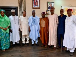 4th Left, RMAFC Chairman, Dr Mohammed Bello Shehu, OFR; 4th Right National Vice Chairman of Council of retired Permanent Secretaries, Elder Akin Arikawe; 2nd R: Hon. Ismalia Mohammed Agaka (FC Kwara State); 1st L: Hon. (Barr) Rakiya Tanko Ayuba- Haruna (FC Kebbi State); 1st R: Director of Allocation, Dr. U.K Umar, 3rd L: Executive Member of Retired Council, Mr. Jeff C.T Nwosu, 3rd R: Financial Secretary of Retired Council, Alhaji Sabiu Zakaria, 2nd R: Administrative Secretary, Mr Silas T. Ayuba, during the Courtesy visit of the Council to the Commission.
