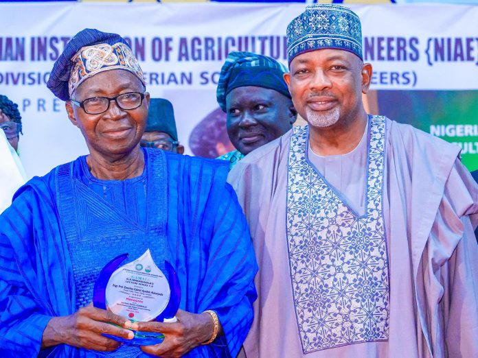 The Minister of Agriculture and Food Security, Sen Abubakar Kyari and Prof Gabriel Makanjuola during the Lecture/ award ceremony in OAU, Ile-Ife in Osun State.