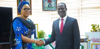 Caption: L:R: Director General of PTAD, Mrs Tolulope Odunaiya in a warm handshake with the Minister of Finance, Mr Taiwo Oyedele.