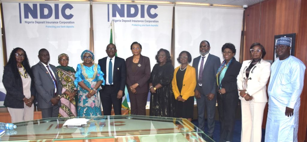 L-R The Ag. National Coordinator/CEO of the SERVICOM Office, Mrs. Helen Lawal (4th), the Managing Director and Chief Executive of the Nigeria Deposit Insurance Corporation (NDIC), Mr. Thompson Oludare Sunday (5th) and Executive Director of Corporate Services, Mrs. Emily Osuji (6th) in a group photograph with the management teams of the two Agencies during the courtesy visit to the Head Office of the NDIC on 7th July, 2026.