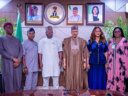 (R–L) Director of Operations, National Identity Management Commission (NIMC), Mr. Uche Chigbo; Director-General/Chief Executive Officer, National Identity Management Commission (NIMC), Engr. Abisoye Coker-Odusote; Honourable Minister of Information and National Orientation, Mohammed Idris, fnipr; Director-General, National Orientation Agency (NOA), Mallam Lanre Issa-Onilu; Acting Permanent Secretary, Federal Ministry of Information and National Orientation, and Director, Production, Publication and Documentation Department (PPDD), Mr. Ibidapo Okunnu; and Director, Public Relations and Protocol Department (PRPD), Dr. Suleiman Haruna, during a courtesy visit by the Director-General of the National Identity Management Commission (NIMC) to the Honourable Minister on July 8, 2026, in Abuja. Photo: Khalid Ahmed/FMINO.