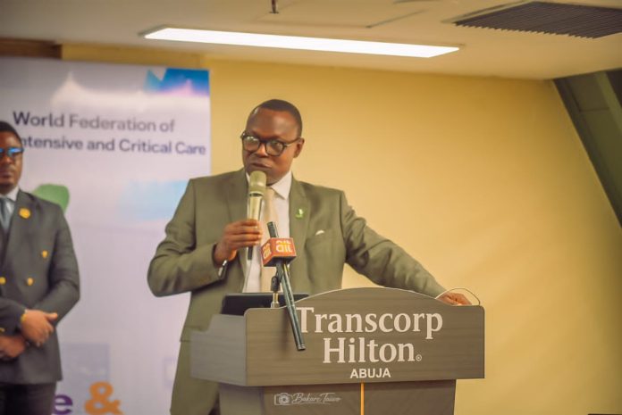 IMG-20260709-WA0004 Dr. Iziaq Adekunle Salako delivering his keynote Address at the 11th Intensive and Critical Care Society of Nigeria Conference and Annual General Meeting, tagged "Abuja 26"