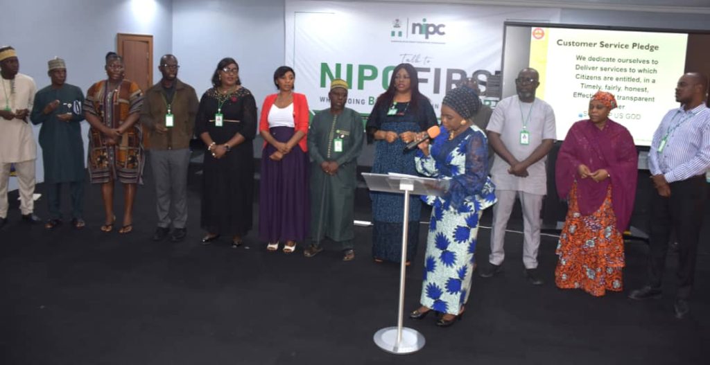 The Ag. National Coordinator/CEO of the SERVICOM Office, Mrs. Helen Lawal performing the official inauguration of the Parastatal SERVICOM Unit/Parastatal SERVICOM Committee (PSU/PSC) at the Nigerian Investment Promotion Commission (NIPC) on 9th July, 2026 in Abuja.
