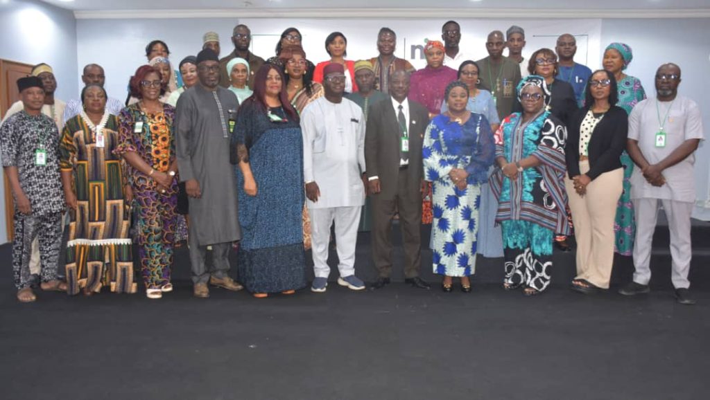 R-L The Ag. National Coordinator/CEO of the SERVICOM Office, Mrs. Helen Lawal (4th) and the Human Resources Director of the Nigerian Investment Promotion Commission (NIPC), Mr. Bashir Mukhtar (5th) in a group photograph with the Management Team and members of the newly inaugurated Parastatal SERVICOM Unit/Parastatal SERVICOM Committee (PSU/PSC) on 9th July, 2026 in Abuja.