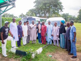 Representative of the Secretary to the Government of the Federation and Permanent Secretary (General Services Office), Dr. Ibrahim Abubakar Kana, mni, (6th left) flanked by some Management Staff of OSGF and Benue State APC Stakeholders as he handes over the keys of the two buses donated by SGF, Sen. George Akume CON to the Chairman of Joint Council of Unions in the Office of the Secretary to the Government of the Federation, Comrade Paul Idowu on Friday, 10th July, 2026 in Abuja.