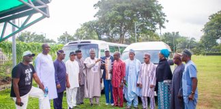 Representative of the Secretary to the Government of the Federation and Permanent Secretary (General Services Office), Dr. Ibrahim Abubakar Kana, mni, (6th left) flanked by some Management Staff of OSGF and Benue State APC Stakeholders as he handes over the keys of the two buses donated by SGF, Sen. George Akume CON to the Chairman of Joint Council of Unions in the Office of the Secretary to the Government of the Federation, Comrade Paul Idowu on Friday, 10th July, 2026 in Abuja.