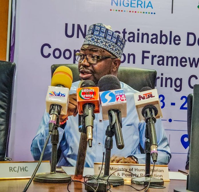 The Honourable Minister of Humanitarian Affairs and Poverty Reduction Dr. Bernard M. Doro presenting his address at the UN house today during the meeting.