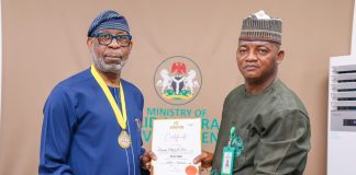 Minister of Solid Minerals Development, Dele Alake (left), and the Director-General of the Advertising Regulatory Council of Nigeria (ARCON), Dr. Olalekan Fadolapo, during the conferment of an Honorary Fellowship by ARCON on the Minister at the Ministry of Solid Minerals Development headquarters in Abuja on July 15, 2026.