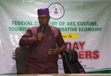 Barr. Peter Mbam, Director Legal, representative of the Permanent Secretary, Mr. Abdulkarim Ozi Ibrahim delivering the PS opening remarks at the FMACTCE'S Stakeholders' engagement session for Data Protection compliance in Abuja.