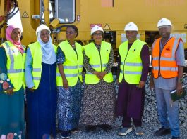 (2nd frm r) Permanent Secretary, Federal Ministry of Transportation, Engr Funsho Adebiyi, (3rd frm r), Director-General, Debt Management Office, (DMO),Patience Oniha Director, Rail Transport Services, Federal Ministry of Transportation, Engr. Finbarr Zirra, (3rd frm l), Elizabeth Ekpenyong, Director, Portfolio Management Department, (2nd frm l), Maimuna Ibrahim - Team Leader, Loans and Other Financing Products Unit, DMO, and (1st l), Halimat Abdulazeez, Assistant Chief Operations Officer, Debt Recording and Settlement Department