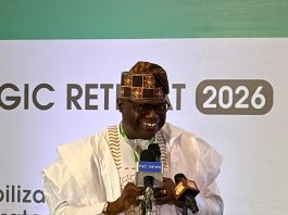 Representative of RMAFC Chairman, Hon. Kolade Daniel Abimbola delivering his speech at the Stakeholders Strategic Retreat organized by RMAFC in Lagos State.