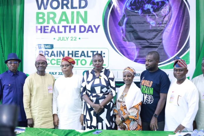 PHOTO-NEWS: ( L-R) Dr. Charles Nzelu, Director, Public Health FMOHSW, 3rd is Professor Oye Gureje, Chairman, National Mental Health Technical Working Group, 4th is the Permanent Secretary FMOHSW, Daju Kachollom S. mni, 5th is Professor A'ishatu Yusha'u Armaya'u, Medical Director, Neoroupsychatrict Hospital, Kaduna, 6th isDr. Tunde Masseyferguson Ojo, National Coordinator, National Mental Health Programme, and Dr. Baba ISSA at the First Nigeria Commemoration of the World Brain Day held in Abuja.