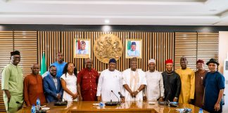 (Center) Secretary to the Government of the Federation, Sen. George Akume, CON, flanked by the Permanent Secretary (GSO), Dr. Ibrahim Abubakar Kana mni, (6th left), the National Chairman, Association of Community Pharmacists of Nigeria (ACPN), Pharm. Ambrose Igwekanma Ezeh (5th right) and other members of the Association and aides of the SGF, in a group photograph during a courtesy visit on Thursday, 23rd July, 2026 in Abuja.