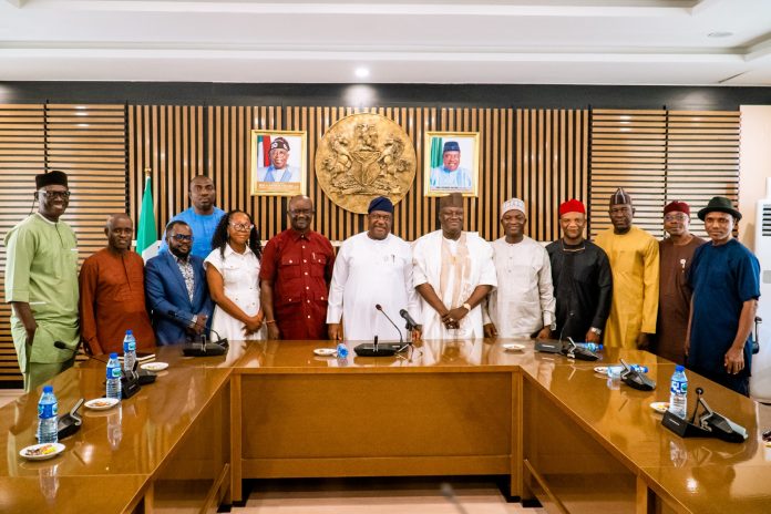 IMG-20260723-WA0132 (Center) Secretary to the Government of the Federation, Sen. George Akume, CON, flanked by the Permanent Secretary (GSO), Dr. Ibrahim Abubakar Kana mni, (6th left), the National Chairman, Association of Community Pharmacists of Nigeria (ACPN), Pharm. Ambrose Igwekanma Ezeh (5th right) and other members of the Association and aides of the SGF, in a group photograph during a courtesy visit on Thursday, 23rd July, 2026 in Abuja.